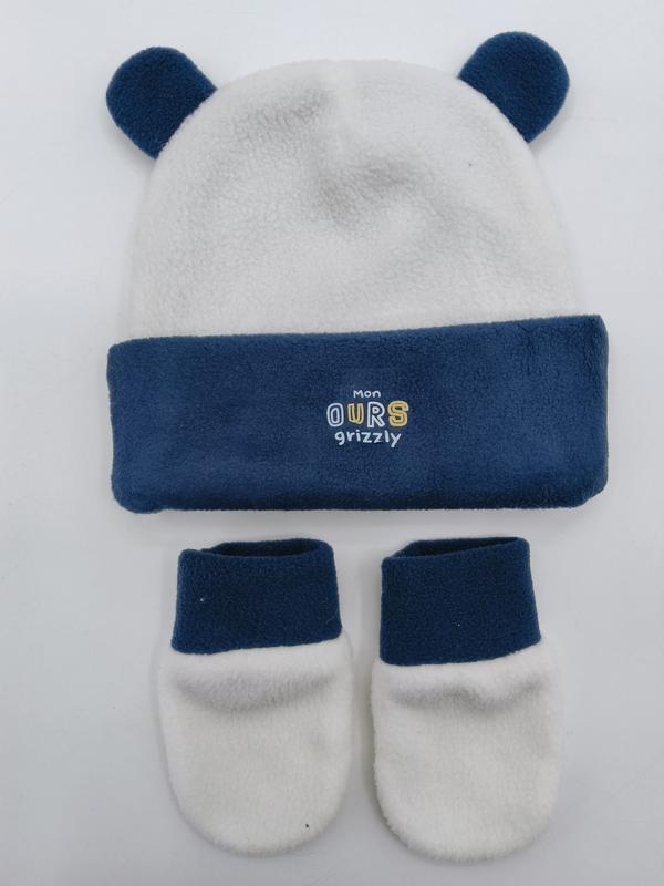 Marineblau-cremefarbenes Baby-Fleece-Set mit Bärenmütze und passenden Söckchen, bestickt mit Mon Ours Grizzly Schriftzug